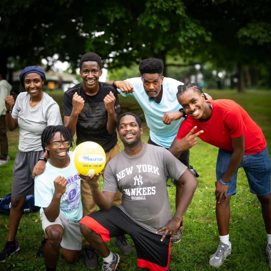 Church members after a volley ball game at a Generations Church picnic